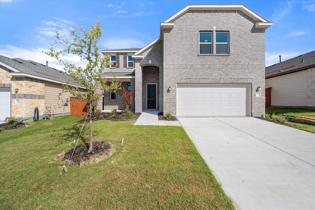 front facade featuring a garage and a front lawn