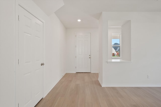 foyer with light hardwood / wood-style floors