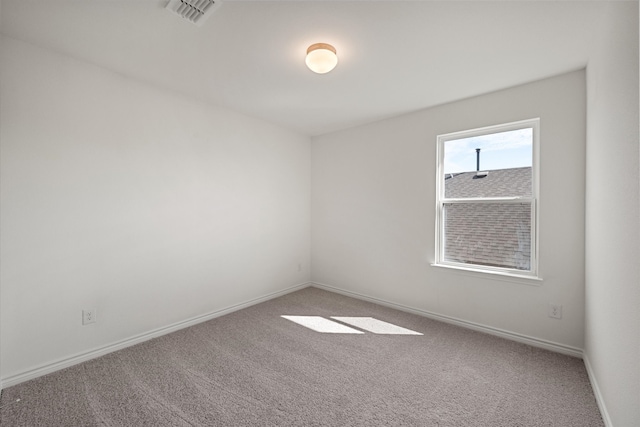 unfurnished room with carpet