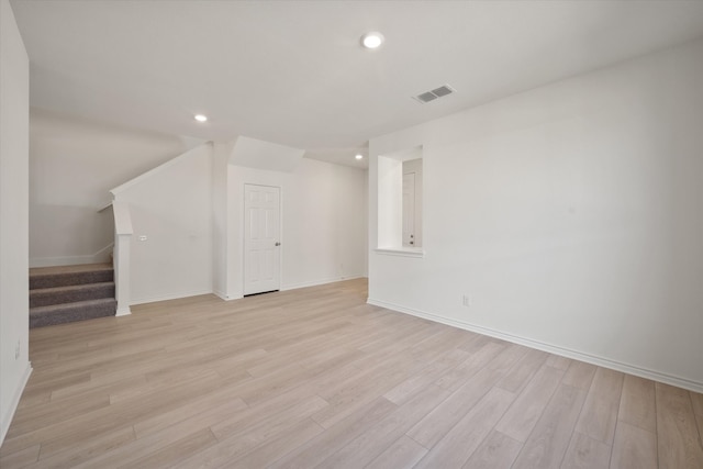 additional living space with light wood-type flooring