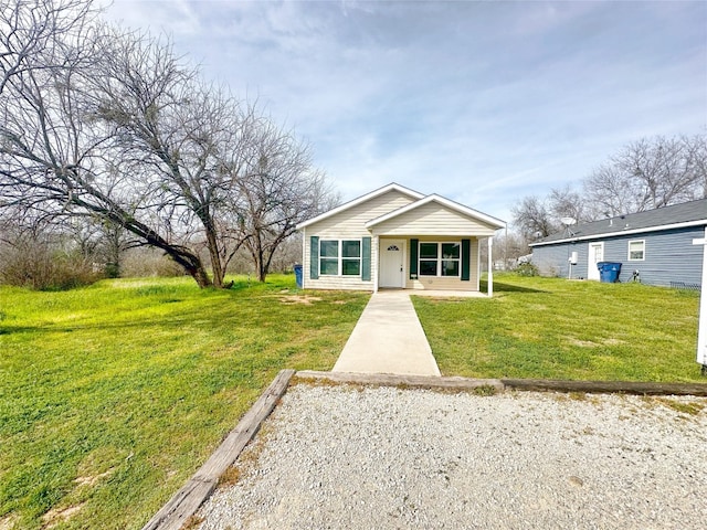 view of front of property with a front lawn