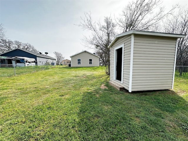 view of yard featuring a storage unit