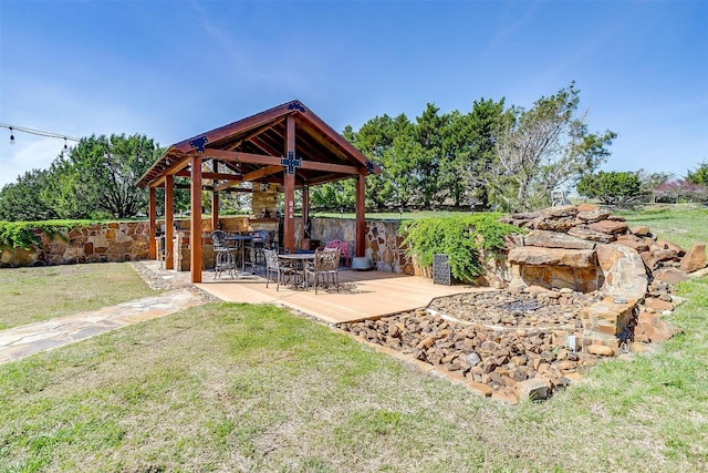 view of yard featuring a patio area and a bar