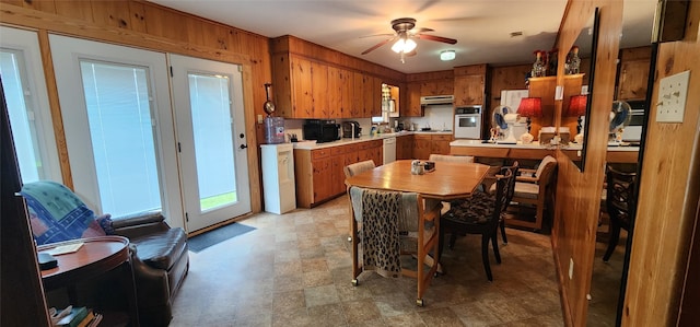 kitchen with oven, tile floors, ceiling fan, and dishwasher