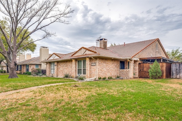 single story home with a front yard