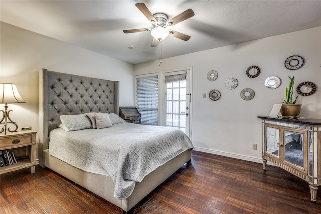 bedroom with ceiling fan and dark wood-type flooring