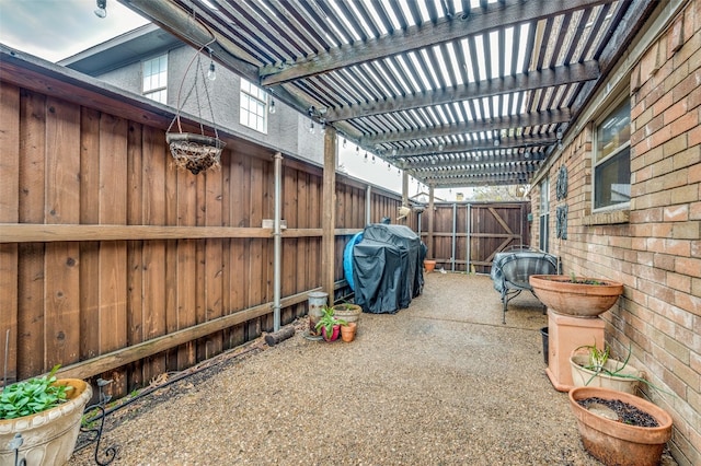 view of patio / terrace featuring a pergola and grilling area