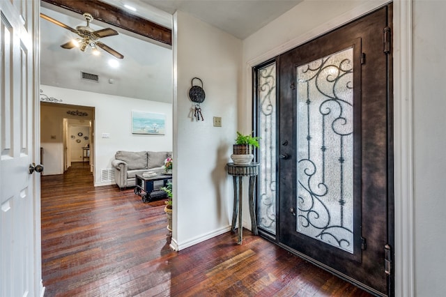 entrance foyer with beam ceiling, ceiling fan, and dark hardwood / wood-style flooring