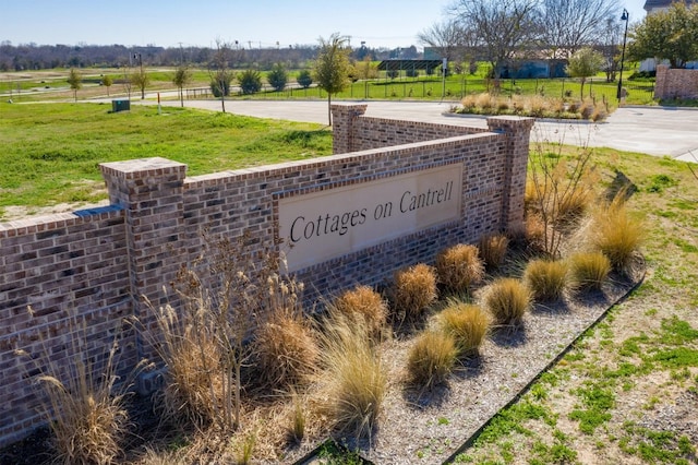 view of community sign