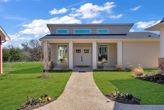 view of front of house with a front lawn