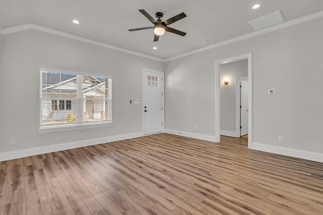 unfurnished room featuring ceiling fan, ornamental molding, and light hardwood / wood-style floors