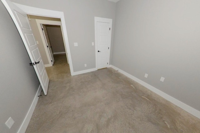 unfurnished bedroom with light colored carpet