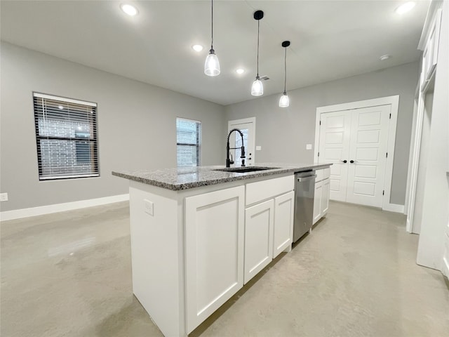 kitchen with white cabinetry, hanging light fixtures, sink, a center island with sink, and stainless steel dishwasher