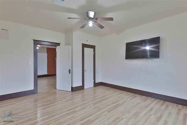 unfurnished bedroom with light hardwood / wood-style flooring and ceiling fan