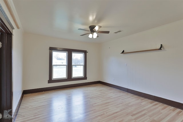 unfurnished room with light hardwood / wood-style floors and ceiling fan