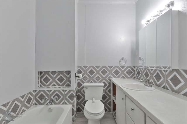 bathroom featuring vanity, tile walls, toilet, and a tub