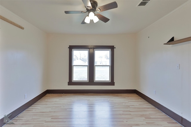 unfurnished room featuring light hardwood / wood-style floors and ceiling fan