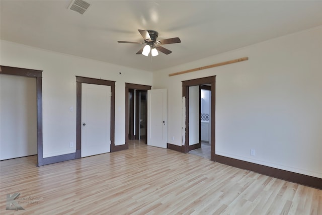 unfurnished bedroom featuring ceiling fan and light wood-type flooring