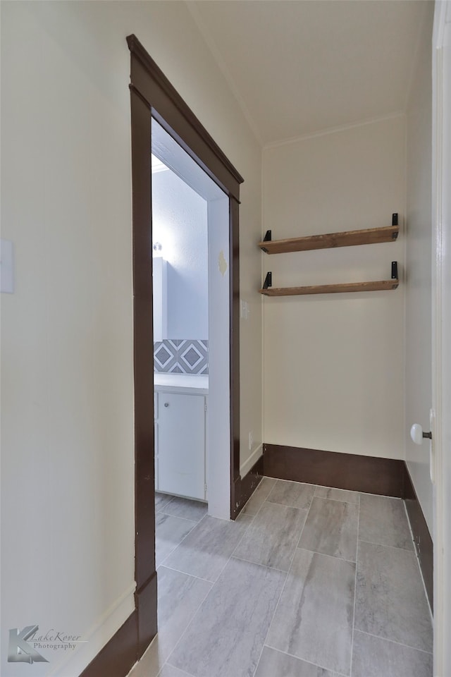 hallway with light tile patterned flooring