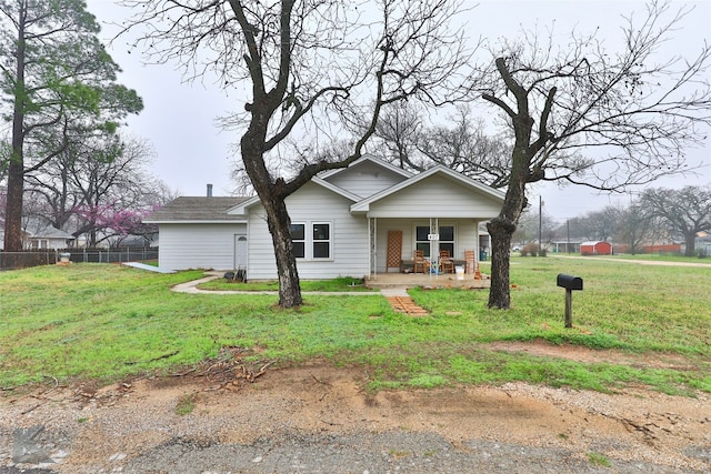 view of front of house with a front lawn