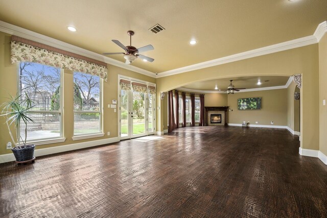 kitchen featuring custom range hood, crown molding, a center island, and appliances with stainless steel finishes