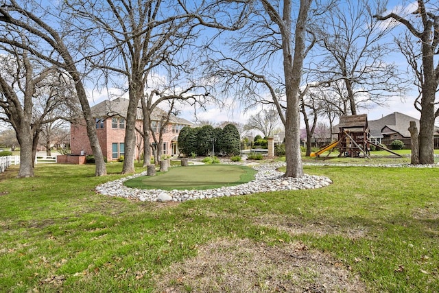 view of yard with a playground