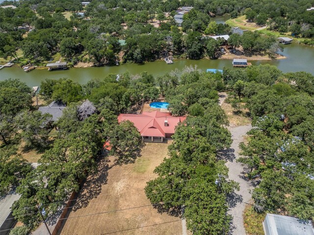 drone / aerial view with a water view