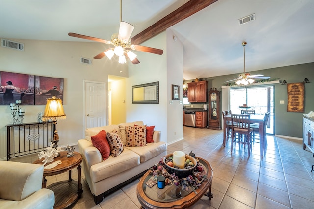 living room featuring vaulted ceiling with beams, light tile floors, and ceiling fan