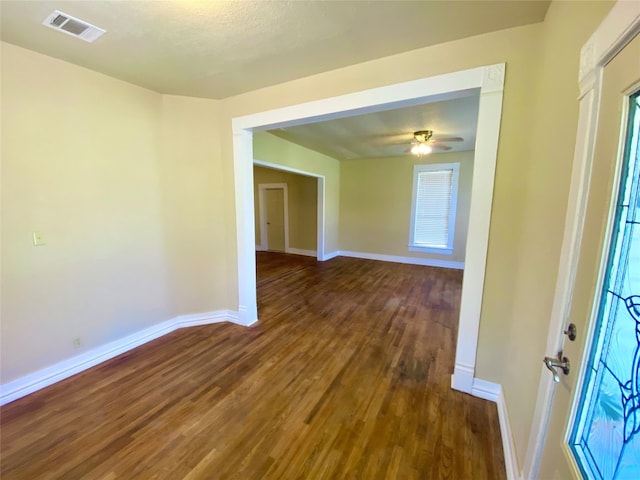 hallway featuring dark hardwood / wood-style flooring