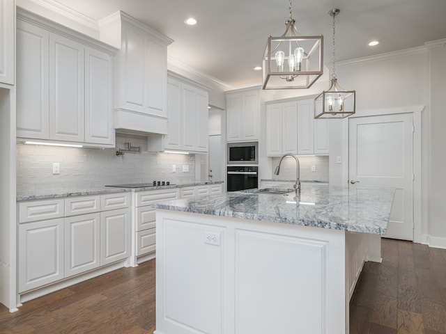 kitchen featuring backsplash, dark wood-type flooring, white cabinetry, and black appliances