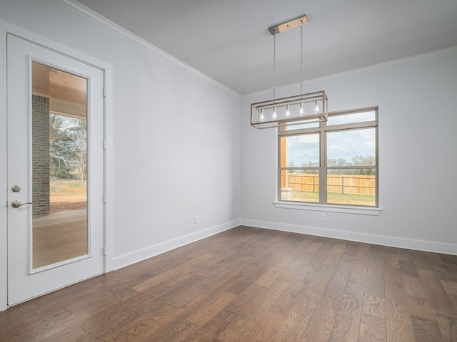 unfurnished room with crown molding and dark wood-type flooring