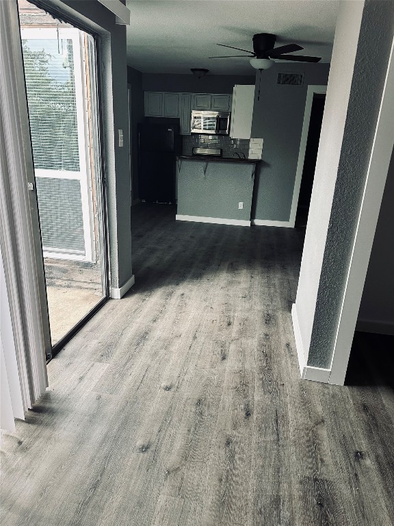 hall featuring dark hardwood / wood-style floors