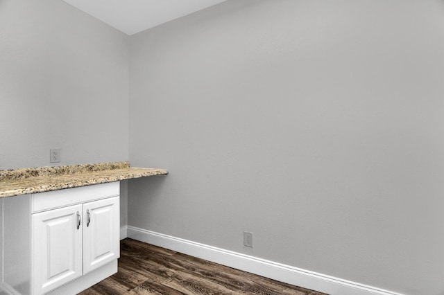 bathroom with vanity and hardwood / wood-style flooring