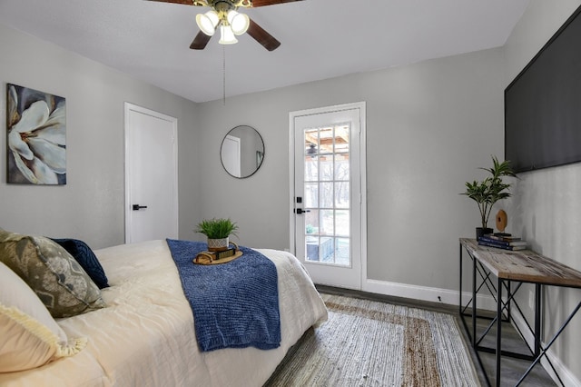 bedroom featuring dark hardwood / wood-style floors and ceiling fan