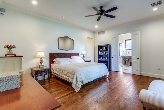 bedroom featuring ceiling fan, dark hardwood / wood-style floors, and ornamental molding