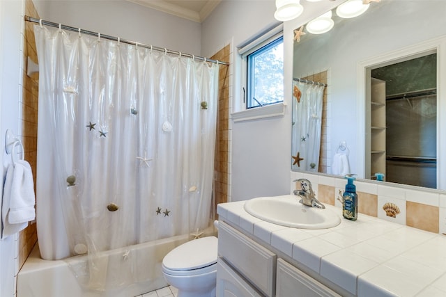 full bathroom with shower / bath combo with shower curtain, vanity, ornamental molding, and toilet