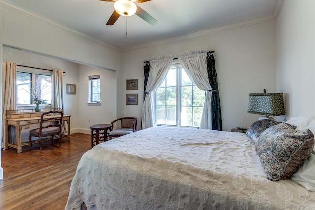 bedroom with ceiling fan, dark hardwood / wood-style flooring, and crown molding