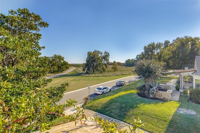 view of community featuring a lawn