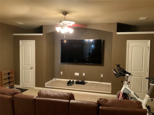 home theater featuring carpet flooring and ceiling fan