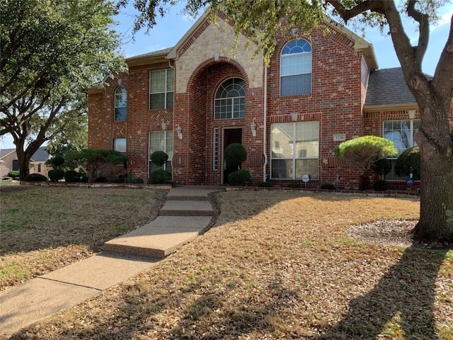 view of front property with a front lawn