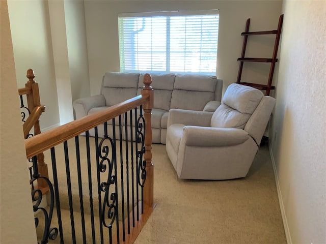 living room featuring light carpet