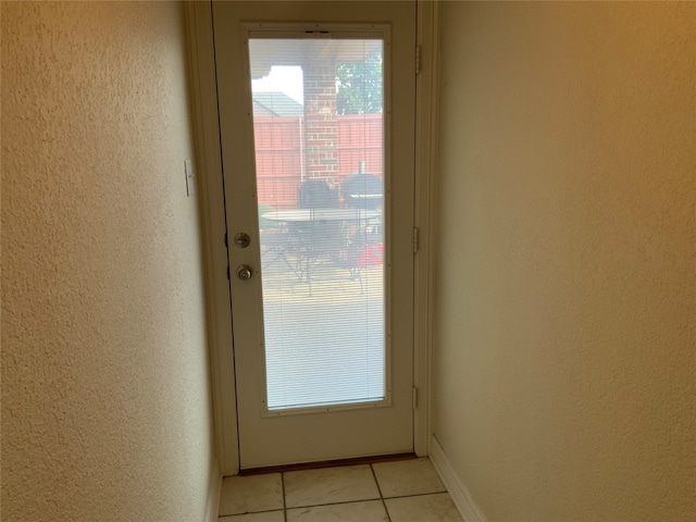 entryway with light tile flooring