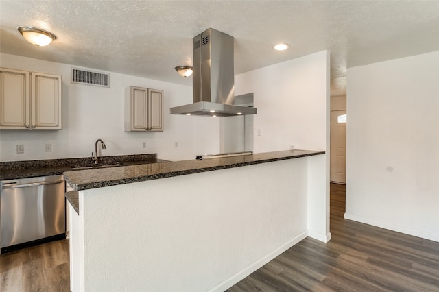 kitchen featuring dark stone counters, stainless steel dishwasher, dark hardwood / wood-style floors, and island exhaust hood