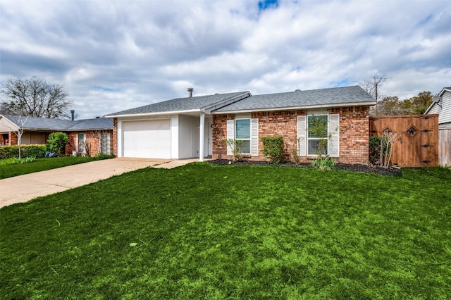 ranch-style home with a front yard and a garage