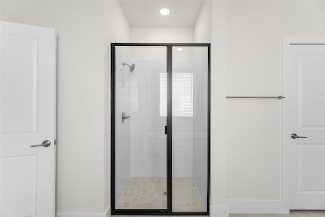 bathroom featuring walk in shower