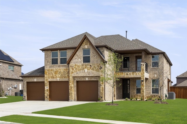 view of front facade featuring solar panels, central AC, a front lawn, and a balcony