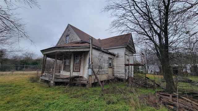 view of property exterior with a yard