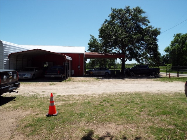 view of yard with a carport