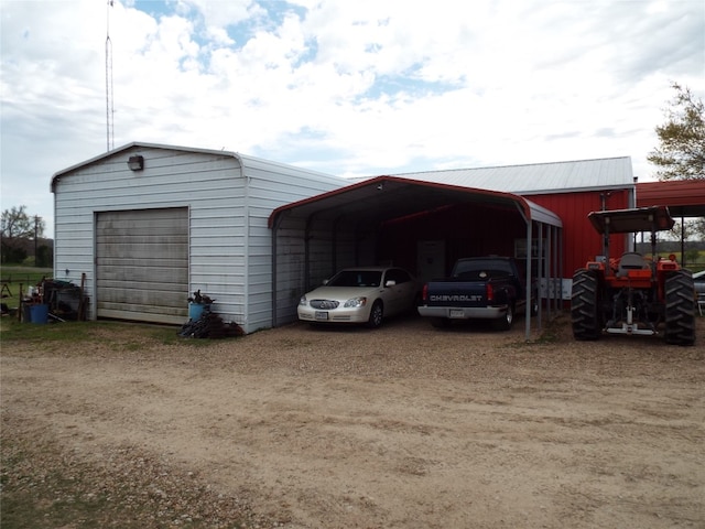 garage with a carport