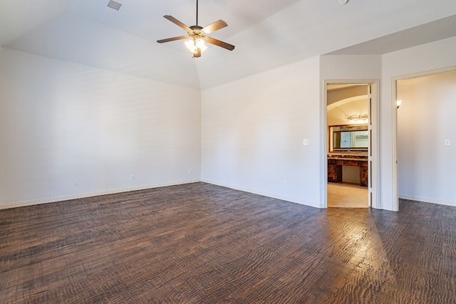 unfurnished bedroom with lofted ceiling, ceiling fan, and dark hardwood / wood-style flooring